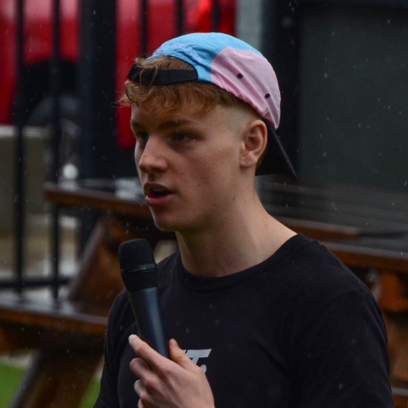 Magnus Kaizik, founder of Onside Consulting, speaking into a microphone